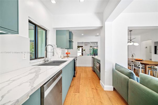 Dining room, Interior, Kitchen, Pendant Lights, Recessed Lighting, Stainless Steel Appliances, Wood Texture Flooring
