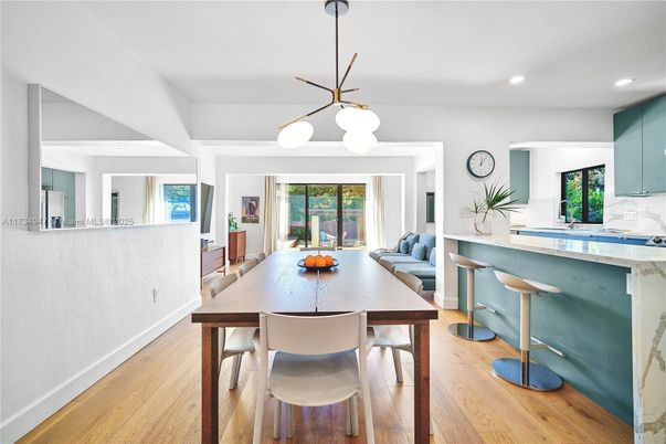 Dining room, Interior, Kitchen, Pendant Lights, Recessed Lighting, Stainless Steel Appliances, Wood Texture Flooring