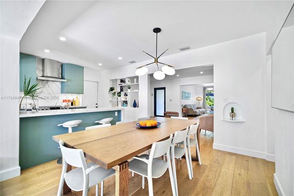 Dining room, Interior, Kitchen, Pendant Lights, Recessed Lighting, Stainless Steel Appliances, Wood Texture Flooring