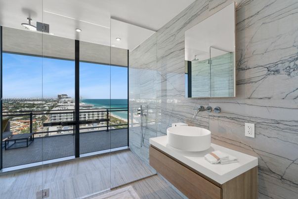 Bathroom, Glass Shower, Interior, Marble Walls, Recessed Lighting, Water, Wood Texture Flooring
