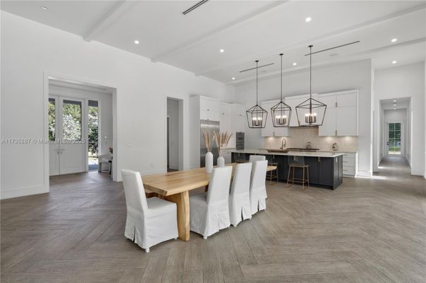 Dining room, Interior, Kitchen, Pendant Lights, Recessed Lighting, Stainless Steel Appliances, Wood Texture Flooring
