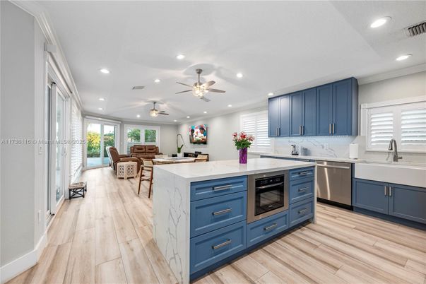Dining room, Interior, Kitchen, Recessed Lighting, Stainless Steel Appliances, Wood Texture Flooring