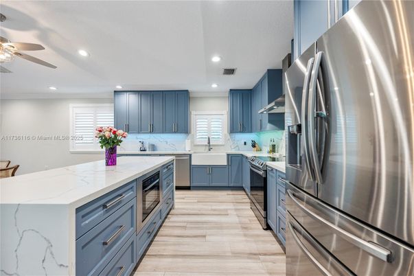 Interior, Kitchen, Recessed Lighting, Stainless Steel Appliances, Wood Texture Flooring