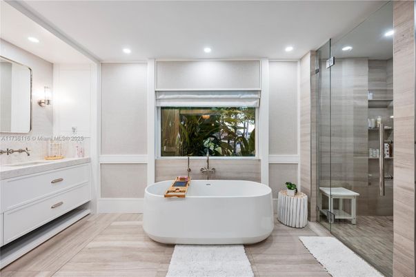 Bathroom, Free Standing Baths, Glass Shower, Interior, Recessed Lighting, Wood Texture Flooring