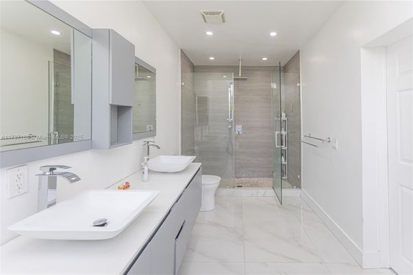 Bathroom, Dual Sink Vanities, Free Standing Baths, Glass Shower, Interior, Marble, Recessed Lighting