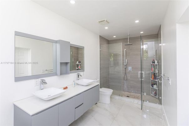 Bathroom, Dual Sink Vanities, Glass Shower, Interior, Marble, Recessed Lighting