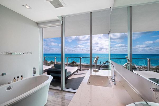 Bathroom, Free Standing Baths, Interior, Recessed Lighting, Water, Wood Texture Flooring