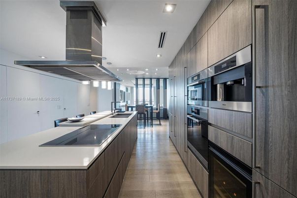 Dining room, Interior, Kitchen, Recessed Lighting, Stainless Steel Appliances, Wood Texture Flooring