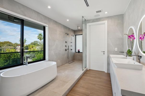 Bathroom, Dual Sink Vanities, Free Standing Baths, Glass Shower, Interior, Recessed Lighting, Wood Texture Flooring