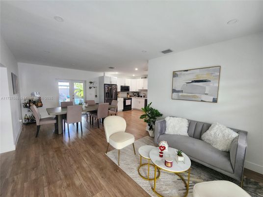 Dining room, Interior, Kitchen, Living room, Recessed Lighting, Stainless Steel Appliances, Wood Texture Flooring