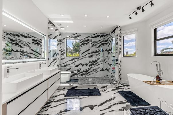 Bathroom, Dual Sink Vanities, Free Standing Baths, Glass Shower, Interior, Marble, Marble Walls, Recessed Lighting