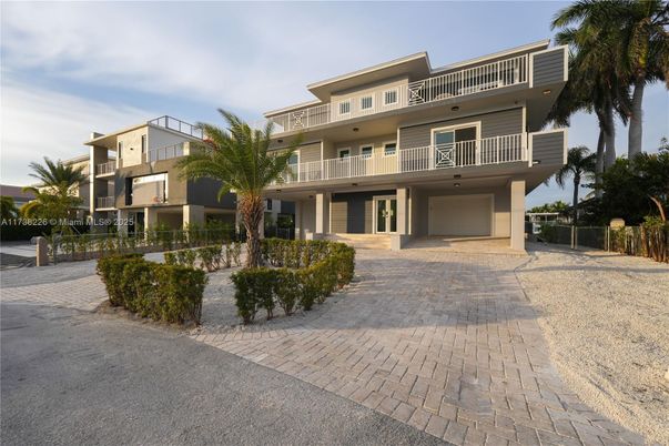 Attached, Exterior, Facade, Condo Building