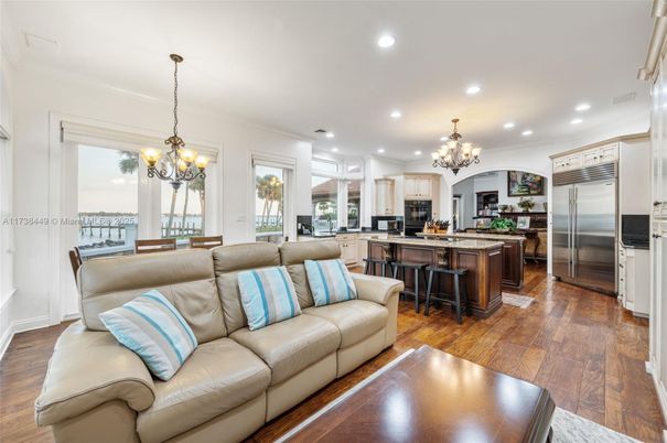 Chandelier, Interior, Kitchen, Living room, Recessed Lighting, Stainless Steel Appliances, Wood Texture Flooring