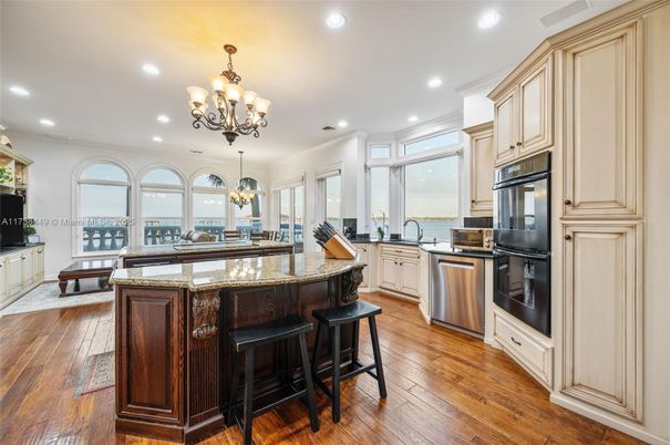 Chandelier, Interior, Kitchen, Recessed Lighting, Stainless Steel Appliances, Wood Texture Flooring