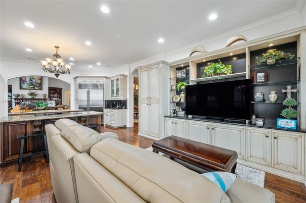 Chandelier, Interior, Kitchen, Living room, Recessed Lighting, Stainless Steel Appliances, Wood Texture Flooring