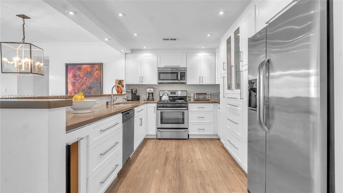 Interior, Kitchen, Pendant Lights, Recessed Lighting, Stainless Steel Appliances, Wood Texture Flooring