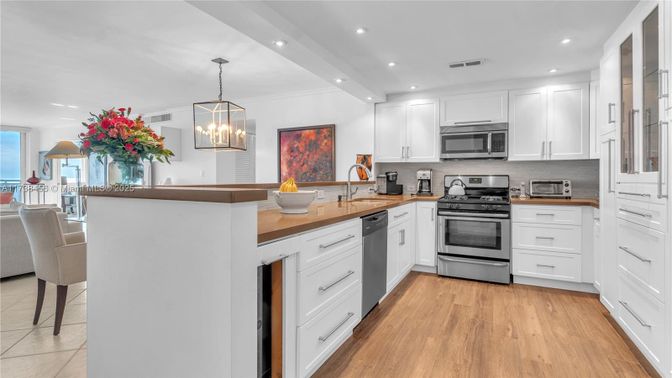 Interior, Kitchen, Pendant Lights, Recessed Lighting, Stainless Steel Appliances, Wood Texture Flooring