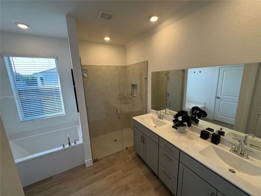 Bathroom, Dual Sink Vanities, Glass Shower, Interior, Recessed Lighting, Wood Texture Flooring