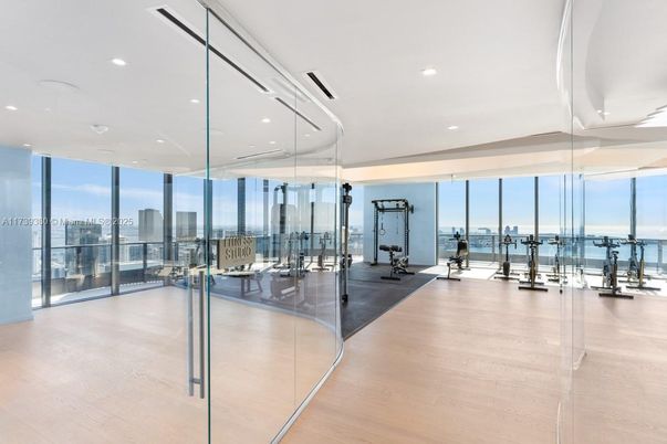 Fitness Equipment, Gym, Interior, Recessed Lighting, Water, Wood Texture Flooring