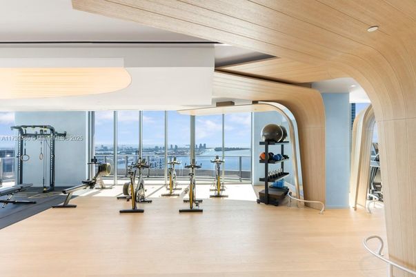 Fitness Equipment, Gym, Interior, Recessed Lighting, Water, Wooden Ceilings, Wood Texture Flooring