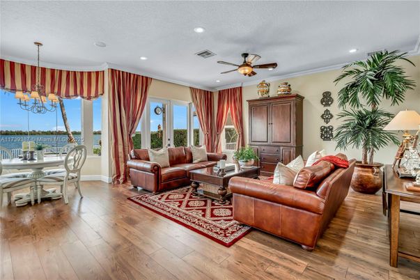 Chandelier, Dining room, Interior, Living room, Recessed Lighting, Water, Wood Texture Flooring