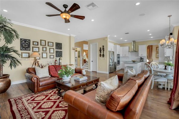 Chandelier, Dining room, Interior, Kitchen, Living room, Recessed Lighting, Stainless Steel Appliances, Wood Texture Flooring