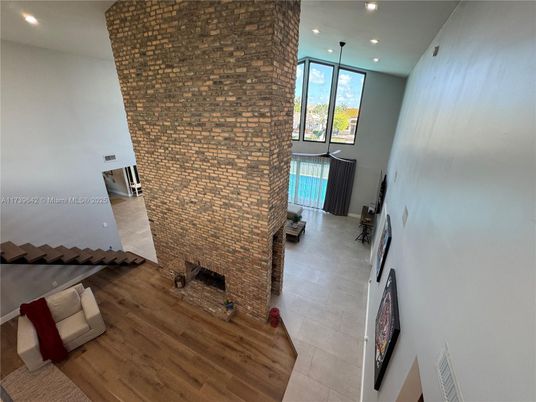 Fireplace, Interior, Recessed Lighting, Stone Walls, Wood Texture Flooring