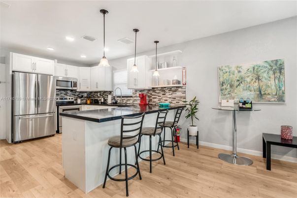 Interior, Kitchen, Pendant Lights, Recessed Lighting, Stainless Steel Appliances, Wood Texture Flooring