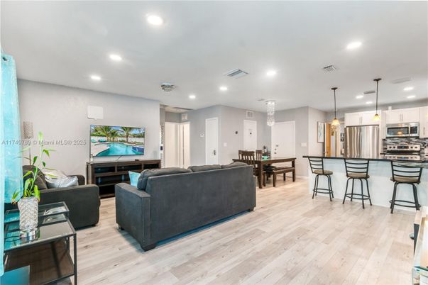 Dining room, Interior, Kitchen, Living room, Pendant Lights, Recessed Lighting, Stainless Steel Appliances, Wood Texture Flooring