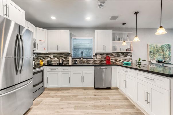 Interior, Kitchen, Pendant Lights, Recessed Lighting, Stainless Steel Appliances, Wood Texture Flooring