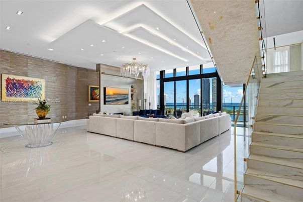 Chandelier, Fireplace, Interior, Living room, Marble, Recessed Lighting