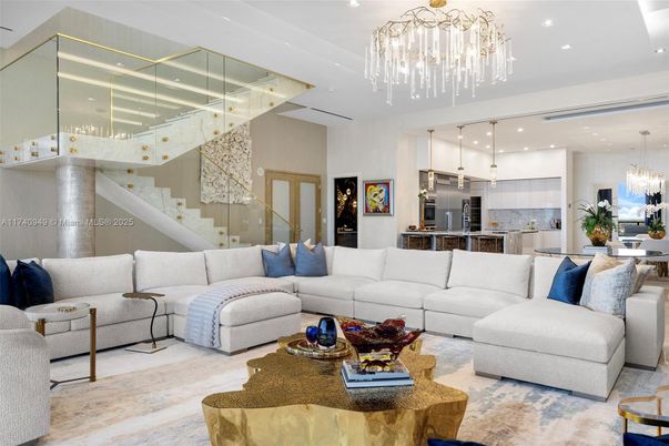 Chandelier, Dining room, Interior, Kitchen, Living room, Pendant Lights, Recessed Lighting, Stainless Steel Appliances, Wood Texture Flooring