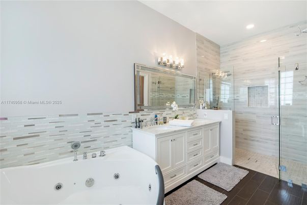 Bathroom, Dual Sink Vanities, Glass Shower, Interior, Recessed Lighting, Wood Texture Flooring