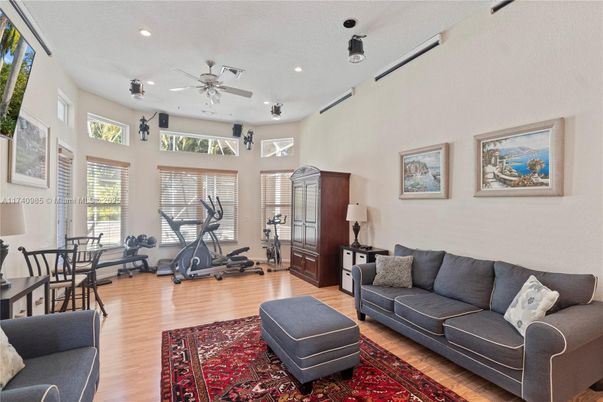 Dining room, Fitness Equipment, Interior, Living room, Recessed Lighting, Wood Texture Flooring