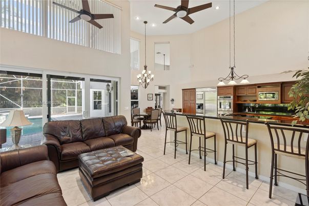 Chandelier, Dining room, Interior, Kitchen, Living room, Pendant Lights, Recessed Lighting, Stainless Steel Appliances