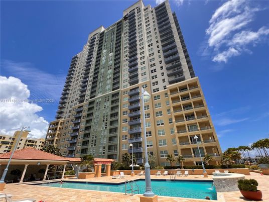 Exterior, Facade, Pool, Condo Building