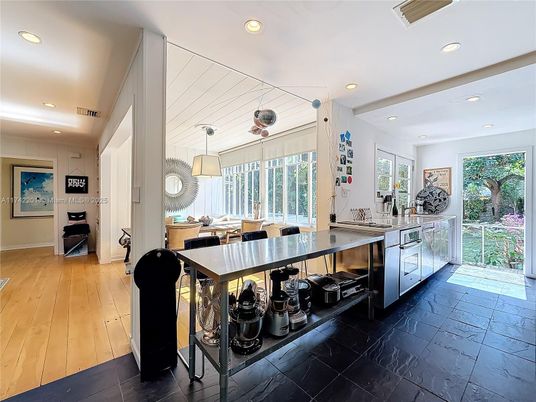 Dining room, Fireplace, Interior, Living room, Pendant Lights, Recessed Lighting, Wood Texture Flooring