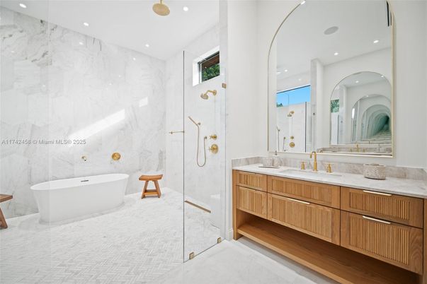 Bathroom, Dual Sink Vanities, Free Standing Baths, Glass Shower, Interior, Marble Walls, Recessed Lighting
