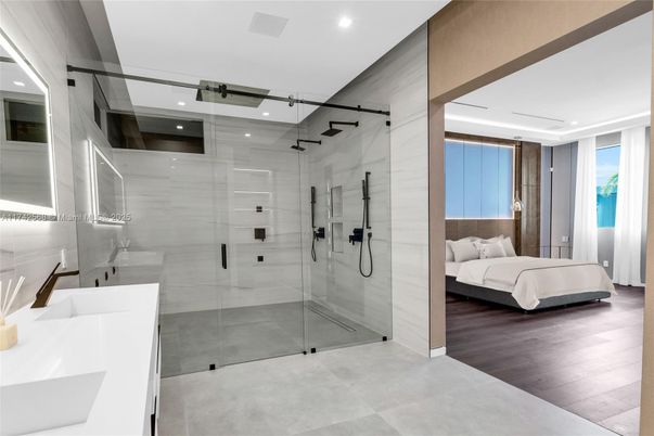 Bathroom, Bedroom, Glass Shower, Interior, Recessed Lighting, Wood Texture Flooring