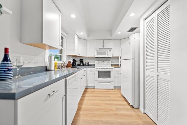 Interior, Kitchen, Recessed Lighting, Stainless Steel Appliances, Wood Texture Flooring