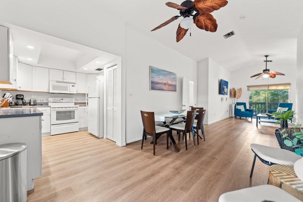 Dining room, Interior, Kitchen, Recessed Lighting, Stainless Steel Appliances, Wood Texture Flooring