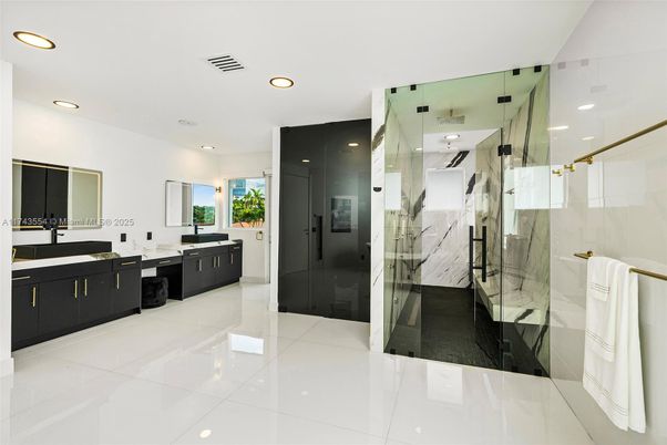 Bathroom, Dual Sink Vanities, Glass Shower, Interior, Marble Walls, Recessed Lighting