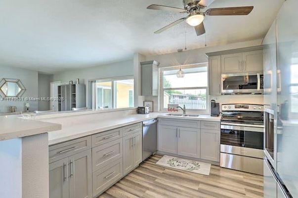 Interior, Kitchen, Pendant Lights, Stainless Steel Appliances, Wood Texture Flooring