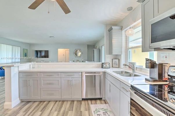 Interior, Kitchen, Pendant Lights, Stainless Steel Appliances, Wood Texture Flooring
