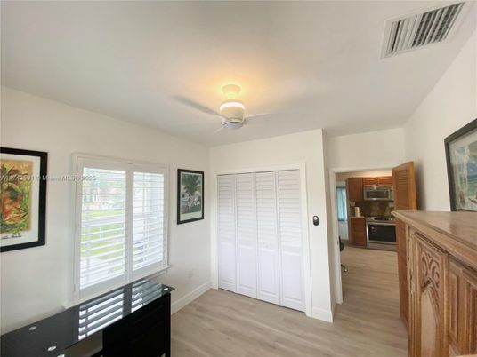 Empty room, Interior, Kitchen, Stainless Steel Appliances, Wood Texture Flooring