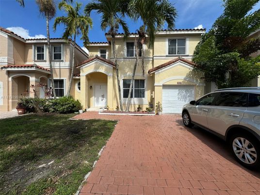 Attached, Exterior, Facade, Mediterranean