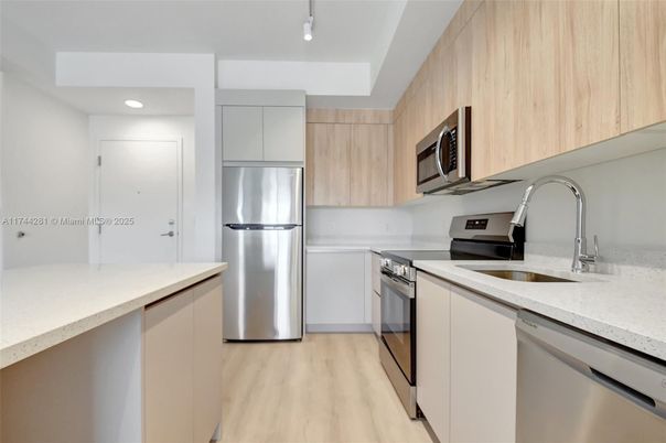 Interior, Kitchen, Recessed Lighting, Stainless Steel Appliances, Wood Texture Flooring