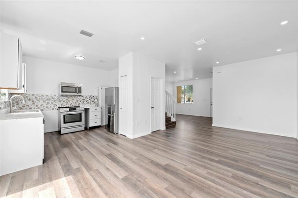 Interior, Kitchen, Recessed Lighting, Stainless Steel Appliances, Wood Texture Flooring