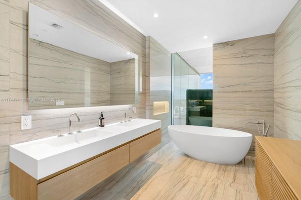 Bathroom, Dual Sink Vanities, Free Standing Baths, Glass Shower, Interior, Marble, Marble Walls, Recessed Lighting