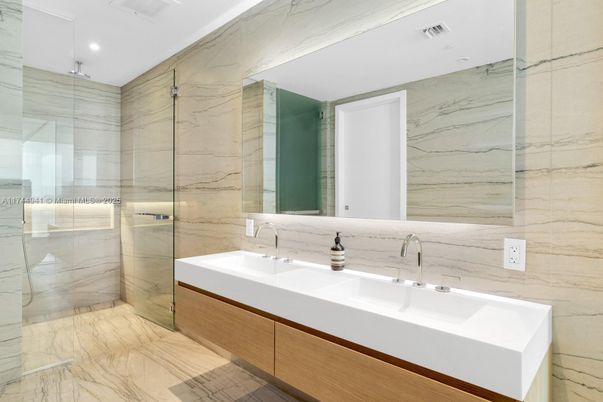 Bathroom, Dual Sink Vanities, Glass Shower, Interior, Marble, Marble Walls, Recessed Lighting